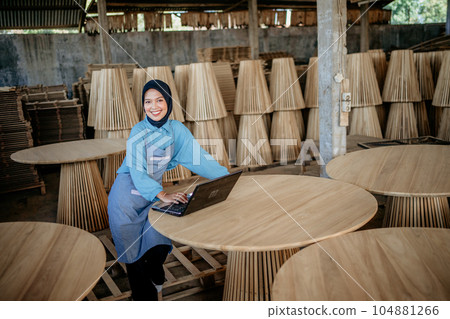 women wearing hijab using laptop pc for working women wearing hijab using laptop pc for working 104881266