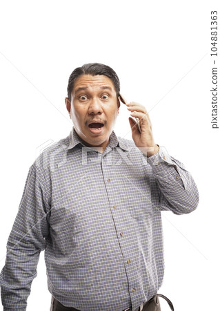 old asian man shocked while talking on phone white background old asian man shocked while talking on phone white background 104881363