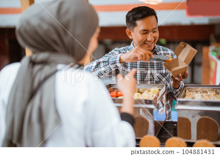 man sells various kinds of dumpling food man sells various kinds of dumpling food 104881431