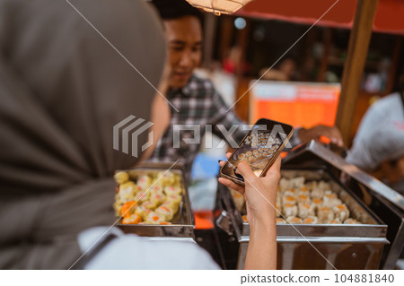 man sells various kinds of dumpling food man sells various kinds of dumpling food 104881840