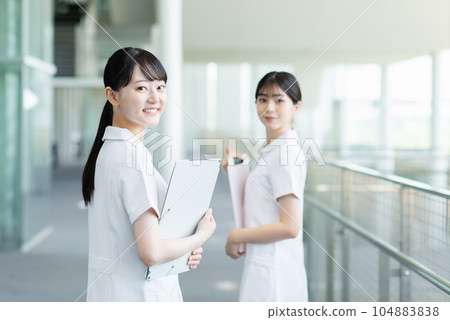 Young female nurse working in a hospital Young female nurse working in a hospital 104883838