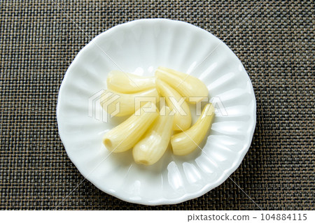 Sweet and sour pickled raccoon. 104884115