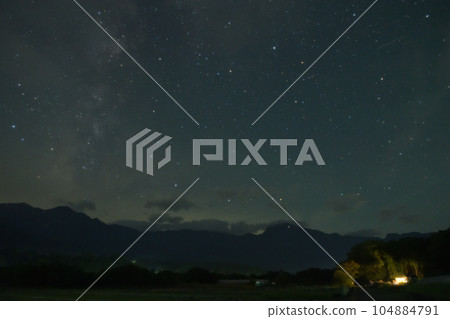 The Milky Way rising from the mountains of the Southern Alps in Takekawa-cho, Hokuto City and the stars in the western sky The Milky Way rising from the mountains of the Southern Alps in Takekawa-cho, Hokuto City and the stars in the western sky 104884791