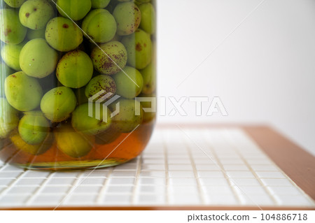Plum wine that has started to pickle Plum wine that has started to pickle 104886718