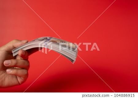 People holding many hundred dollar bills and banknotes for money saving, American dollars, Cash money dollars, Business investment and income, Global financial crisis, Earning and saving money concept People holding many hundred dollar bills and banknotes for money saving, American dollars, Cash money dollars, Business investment and income, Global financial crisis, Earning and saving money concept 104886915