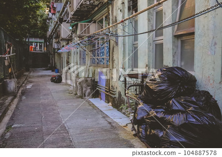 July 8 2023 Little narrow lane in Hong Kong, Pedestrian Alleyway. July 8 2023 Little narrow lane in Hong Kong, Pedestrian Alleyway. 104887578