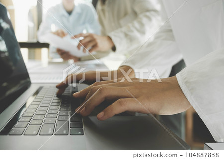 Team work process. Young business managers crew working with new startup project. 104887838