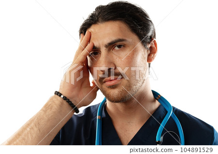 Depressed tired asian doctor with stethoscope isolated on white 104891529