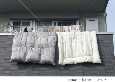 Futon drying on the balcony Futon drying on the balcony 104893008