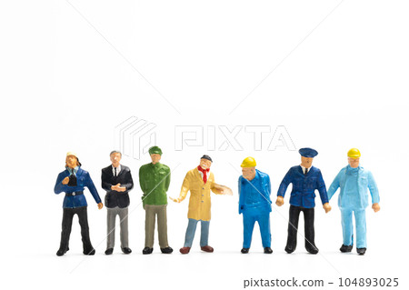 Miniature people different professions standing on white background , Labour day concept Miniature people different professions standing on white background , Labour day concept 104893025
