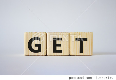 GET symbol. Concept word GET on wooden cubes. Beautiful white background. Business and GET concept. Copy space. GET symbol. Concept word GET on wooden cubes. Beautiful white background. Business and GET concept. Copy space. 104893159