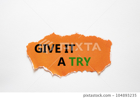 Give it a try symbol. Concept words Give it a try on torn orange paper. Beautiful grey background. Business and Give it a try concept. Copy space. Give it a try symbol. Concept words Give it a try on torn orange paper. Beautiful grey background. Business and Give it a try concept. Copy space. 104893235