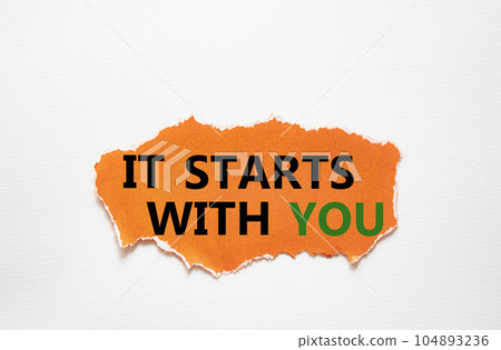 It starts with you symbol. Torn orange paper with words It starts with you. Beautiful white background. Business and It starts with you concept. Copy space. It starts with you symbol. Torn orange paper with words It starts with you. Beautiful white background. Business and It starts with you concept. Copy space. 104893236