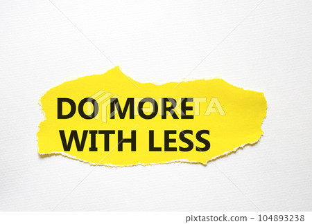 Do more with less symbol. Concept words Do more with less on torn yellow paper. Beautiful white background. Business and Do more with less concept. Copy space. Do more with less symbol. Concept words Do more with less on torn yellow paper. Beautiful white background. Business and Do more with less concept. Copy space. 104893238