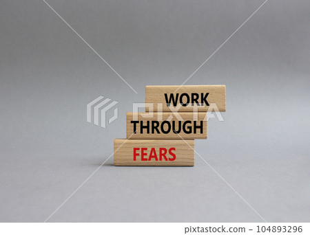 Work through fears symbol. Wooden blocks with words Work through fears. Beautiful grey background. Business and Work through fears concept. Copy space. Work through fears symbol. Wooden blocks with words Work through fears. Beautiful grey background. Business and Work through fears concept. Copy space. 104893296