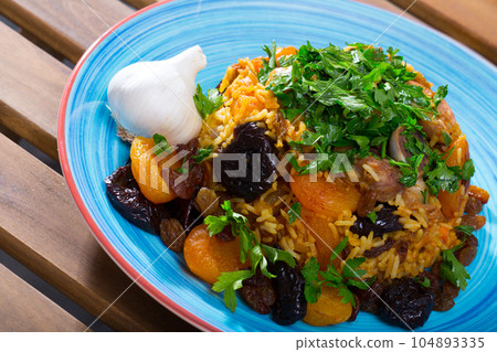 Traditional Central-Asian dish Pilaf 104893335