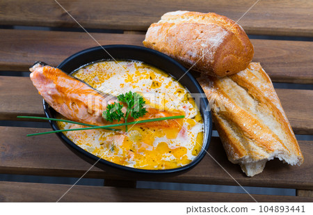 Cheese and salmon soup Cheese and salmon soup 104893441