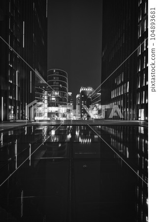 Vertical shot of Hotels and company buildings in the media harbor of Duesseldorf, Germany Vertical shot of Hotels and company buildings in the media harbor of Duesseldorf, Germany 104893681