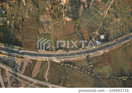Aerial view of the road between Cavusin and Goreme in Cappadocia, Turkey Aerial view of the road between Cavusin and Goreme in Cappadocia, Turkey 104893726