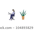 A woman using a laptop and a foliage plant 104893829
