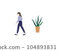 A woman walking with documents and foliage plants A woman walking with documents and foliage plants 104893831