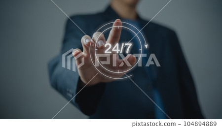 customer service. nonstop service concept. Businessman hand holding virtual 24/7 with clock on hand worldwide nonstop and full-time contact of service concept. customer service. nonstop service concept. Businessman hand holding virtual 24/7 with clock on hand worldwide nonstop and full-time contact of service concept. 104894889