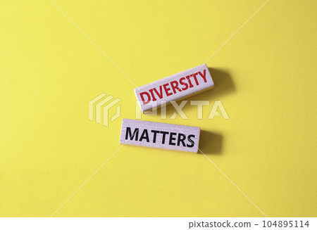 Diversity matters symbol. Wooden blocks with words Diversity matters. Beautiful yellow background. Business and Diversity matters concept. Copy space. Diversity matters symbol. Wooden blocks with words Diversity matters. Beautiful yellow background. Business and Diversity matters concept. Copy space. 104895114