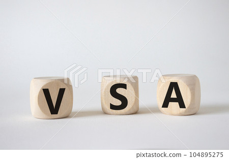 VSA - Volume Spread Analysis symbol. Wooden cubes with word VSA. Beautiful white background. Business and Volume Spread Analysis concept. Copy space. 104895275