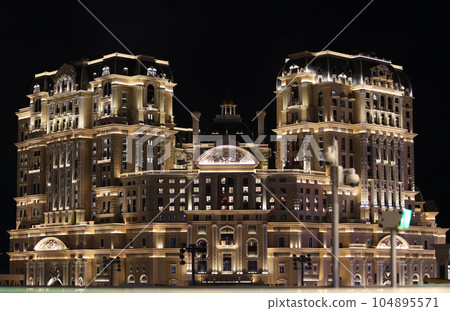 exterior of Grand Lisboa Palace at night. it is the newest casino and hotel in Macau 104895571