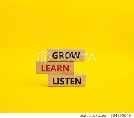 Grow Learn Listen symbol. Concept words Grow Learn Listen on wooden blocks. Beautiful yellow background. Business and Grow Learn Listen concept. Copy space Grow Learn Listen symbol. Concept words Grow Learn Listen on wooden blocks. Beautiful yellow background. Business and Grow Learn Listen concept. Copy space 104895649