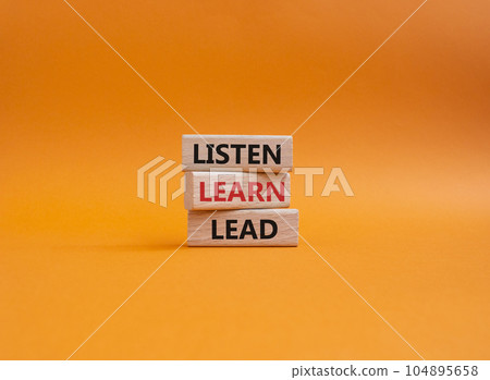 Listen Learn Lead symbol. Concept words Listen Learn Lead on wooden blocks. Beautiful orange background. Business and Listen Learn Lead concept. Copy space. Listen Learn Lead symbol. Concept words Listen Learn Lead on wooden blocks. Beautiful orange background. Business and Listen Learn Lead concept. Copy space. 104895658