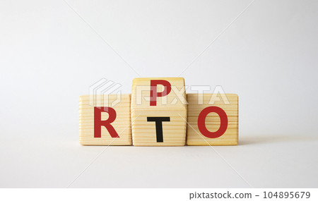 RPO vs RTO symbol. Wooden cubes with words RTO and RPO. Beautiful white background. business concept. Copy space 104895679