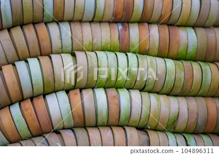 wall of stacked potted plants 104896311