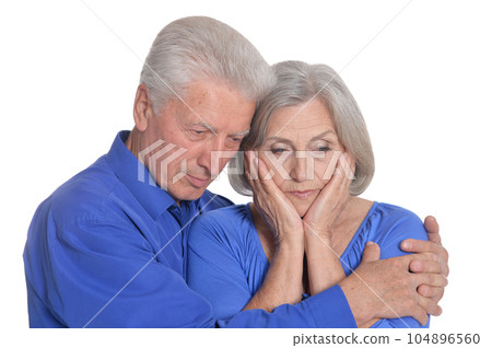 Portrait of sad senior couple isolated Portrait of sad senior couple isolated 104896560