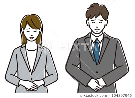 Men and women in suits lowering their heads Men and women in suits lowering their heads 104897946