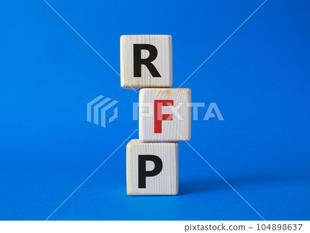RFP - Request for Proposal. Wooden cubes with word RFP. Beautiful blue background. Business and Request for Proposal concept. Copy space. RFP - Request for Proposal. Wooden cubes with word RFP. Beautiful blue background. Business and Request for Proposal concept. Copy space. 104898637