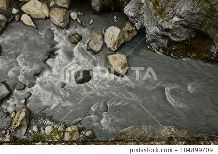 River and huge stones at Tianxiang recreation area in Xiulin township, Taiwan. 104899709