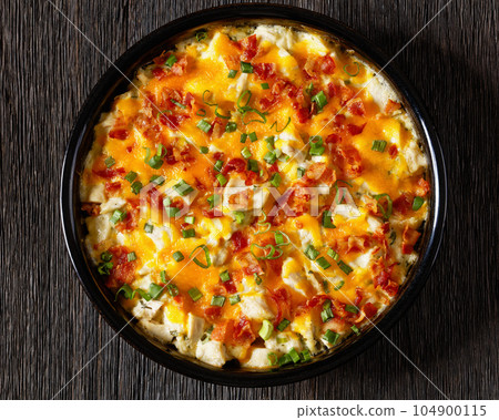 chicken bake in creamy sauce with cheese, bacon 104900115