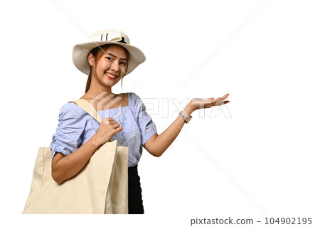 Pretty young woman in summer hat and summer clothes isolated on white background. Holiday, vacation, traveling concept Pretty young woman in summer hat and summer clothes isolated on white background. Holiday, vacation, traveling concept 104902195