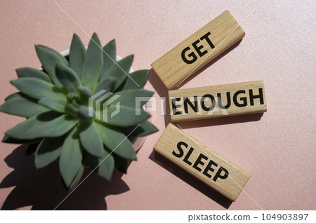 Get enough sleep symbol. Wooden blocks with words Get enough sleep with succulent plant. Beautiful pink background. Healthy lifestyle, medical and Get enough sleep concept. Copy space. Get enough sleep symbol. Wooden blocks with words Get enough sleep with succulent plant. Beautiful pink background. Healthy lifestyle, medical and Get enough sleep concept. Copy space. 104903897