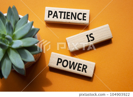 Patience is Power symbol. Concept words Patience is Power on wooden blocks. Beautiful orange background. Business and Patience is Power concept. Copy space. 104903922