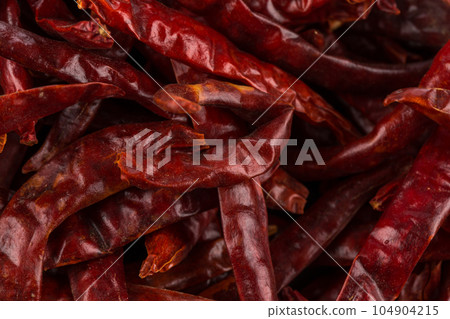 dried chili as a food background dried chili as a food background 104904215