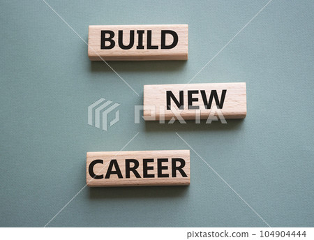 Begin new career symbol. Concept word Begin new career on wooden blocks. Beautiful grey green background. Business and Begin new career concept. Copy space 104904444