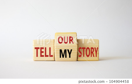 Tell our or my story symbol. Wooden cubes with words Tell my story and tell our story. Beautiful white background. Business concept. Copy space 104904458
