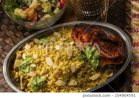 Tandoori chicken and biryani Tandoori chicken and biryani 104904591