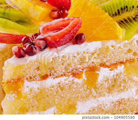 sponge cake with berries and fruits sponge cake with berries and fruits 104905580