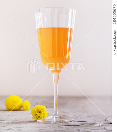 Mimosa alcohol cocktail with orange juice and dry champagne 104905679