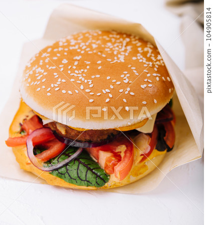Close-up of home made burgers close up Close-up of home made burgers close up 104905814