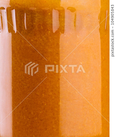 The glass jar with squash caviar close up The glass jar with squash caviar close up 104905843