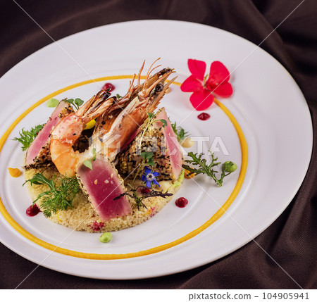 Tuna fish tataki with shrimp and couscous 104905941